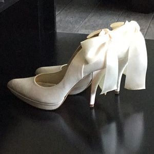 White satin shoes by Pura Lopez